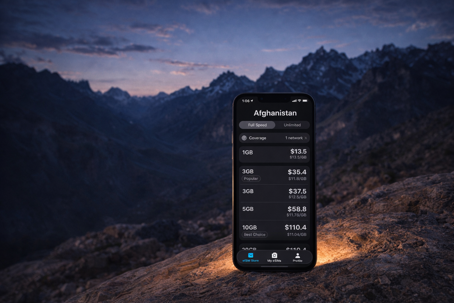 A smartphone with an activated eSIM and strong mobile signal against the Hindu Kush mountains at blue hour, the soft glow of the screen lighting up the stone surface.