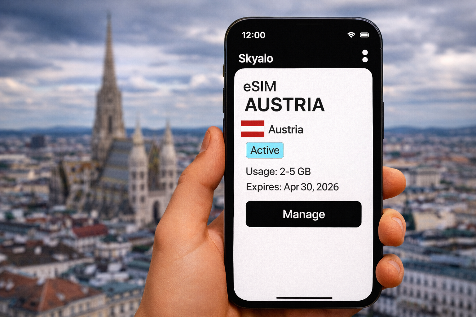 A hand holding a smartphone showing the Skyalo eSIM interface for Austria, with Vienna’s skyline and St. Stephen’s Cathedral in the background; eSIM status Active, valid until April 30, 2026.